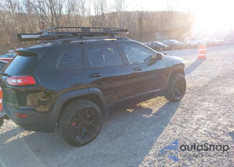 2015 Jeep Cherokee Trailhawk from USA, damaged, VIN 1C4PJMBS9FW780037